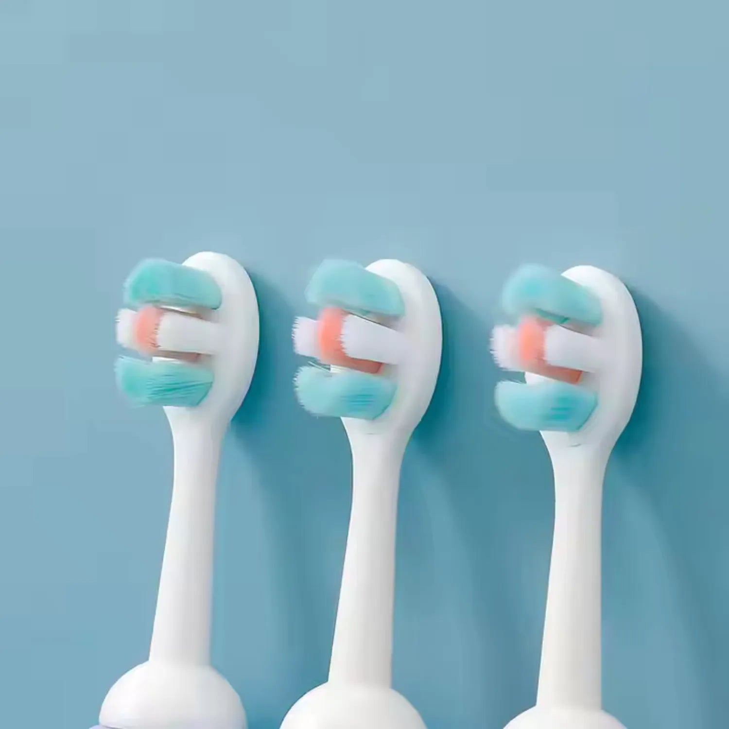 Close-up of astronaut kids toothbrush showing soft bristles and child-friendly easy grip handle