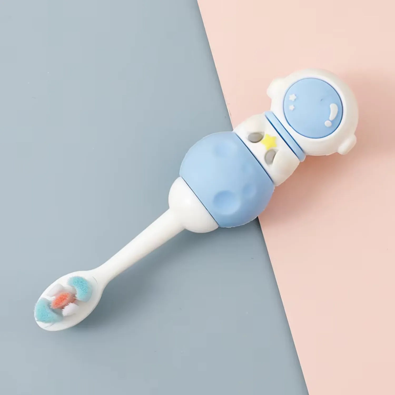 Blue astronaut kids toothbrush with soft bristles and comfortable handle for children aged 2 and over