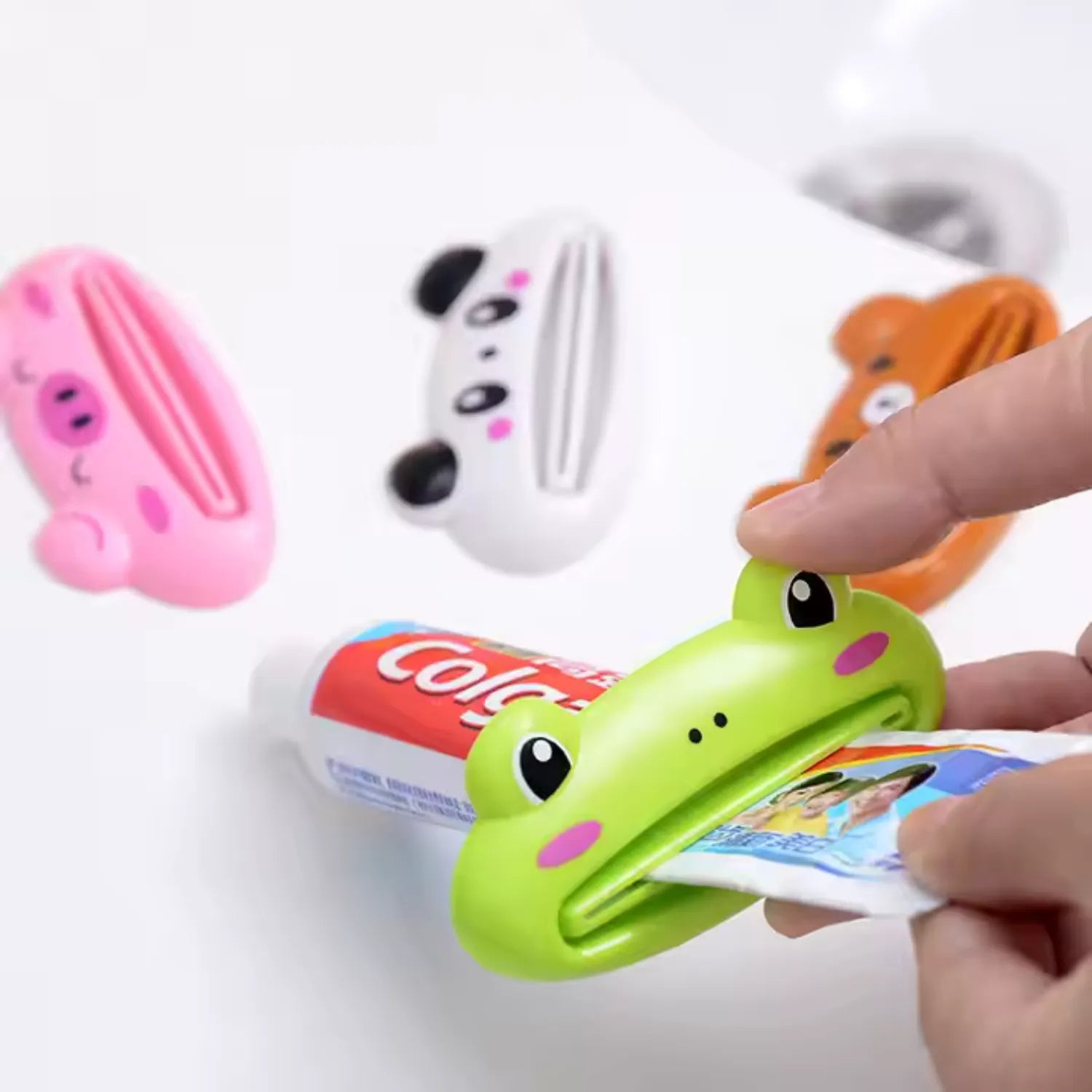Kids toothpaste squeezer in family bathroom helping children brush independently and reduce toothpaste mess