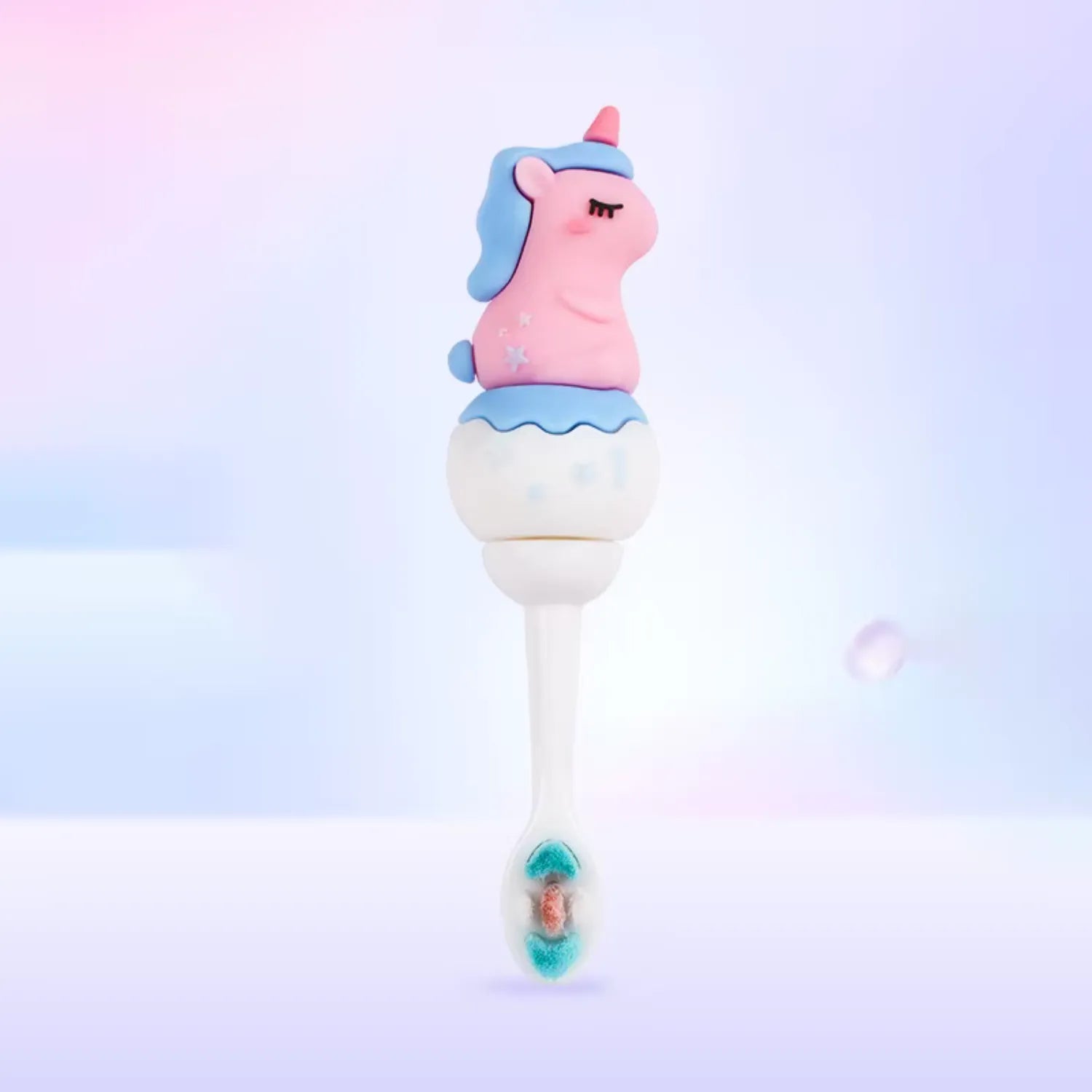 Side view of unicorn kids toothbrush with fun character design and comfortable grip for children