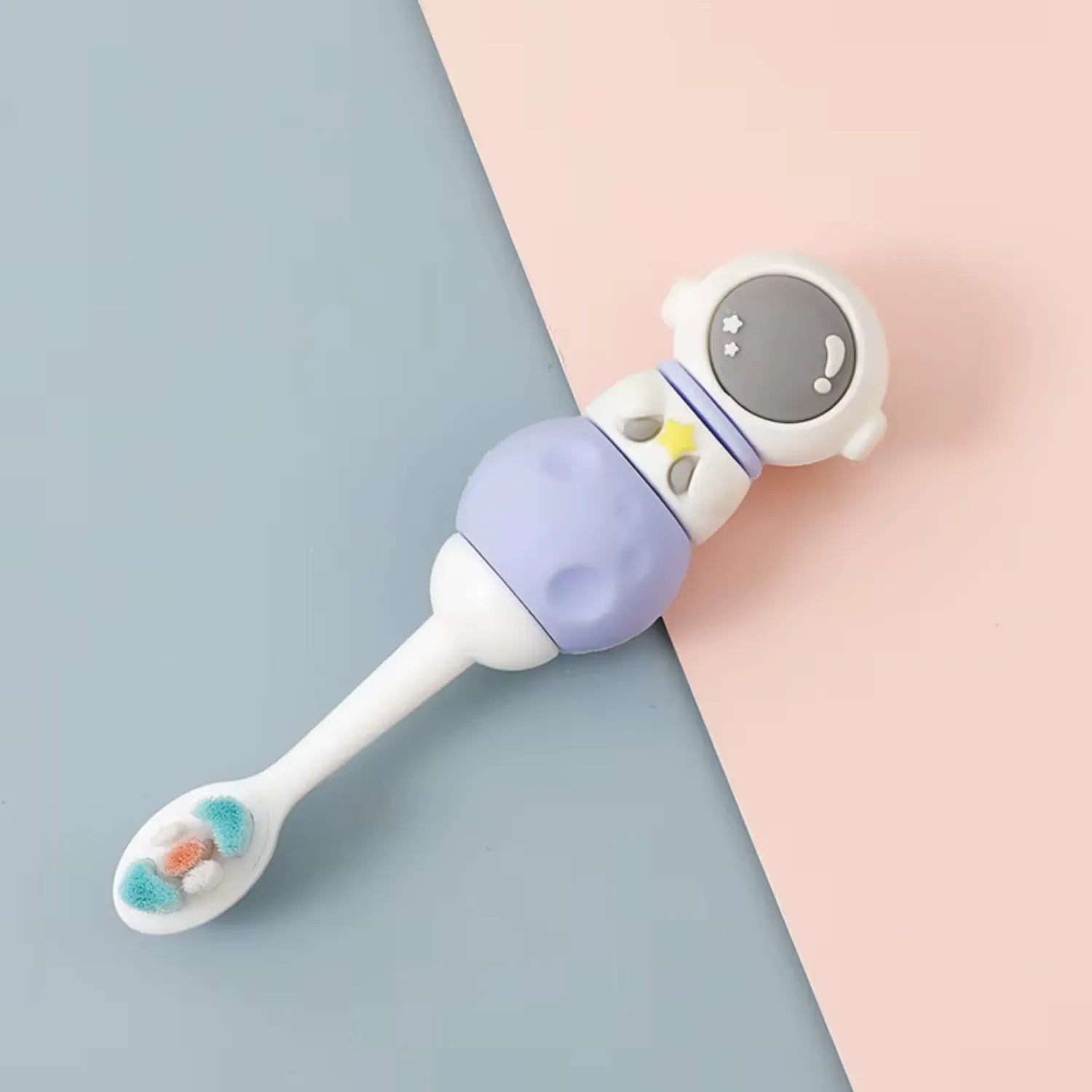 Purple astronaut kids toothbrush designed to make brushing fun with soft gentle bristles for children